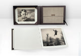 Collector’s Edition of Now Is Always by Vaune Trachtman, showing the presentation box with signed photogravure and the book opened to the image 'Bound," which shows a human figure in the air.