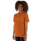 T-Shirt – Person with a devastating secret (gold text)
