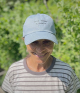 Storymatic hat – Here Comes Trouble (black text)