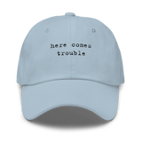 Storymatic hat – Here Comes Trouble (black text)